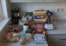 A picture of groceries laid out on a kitchen counter top